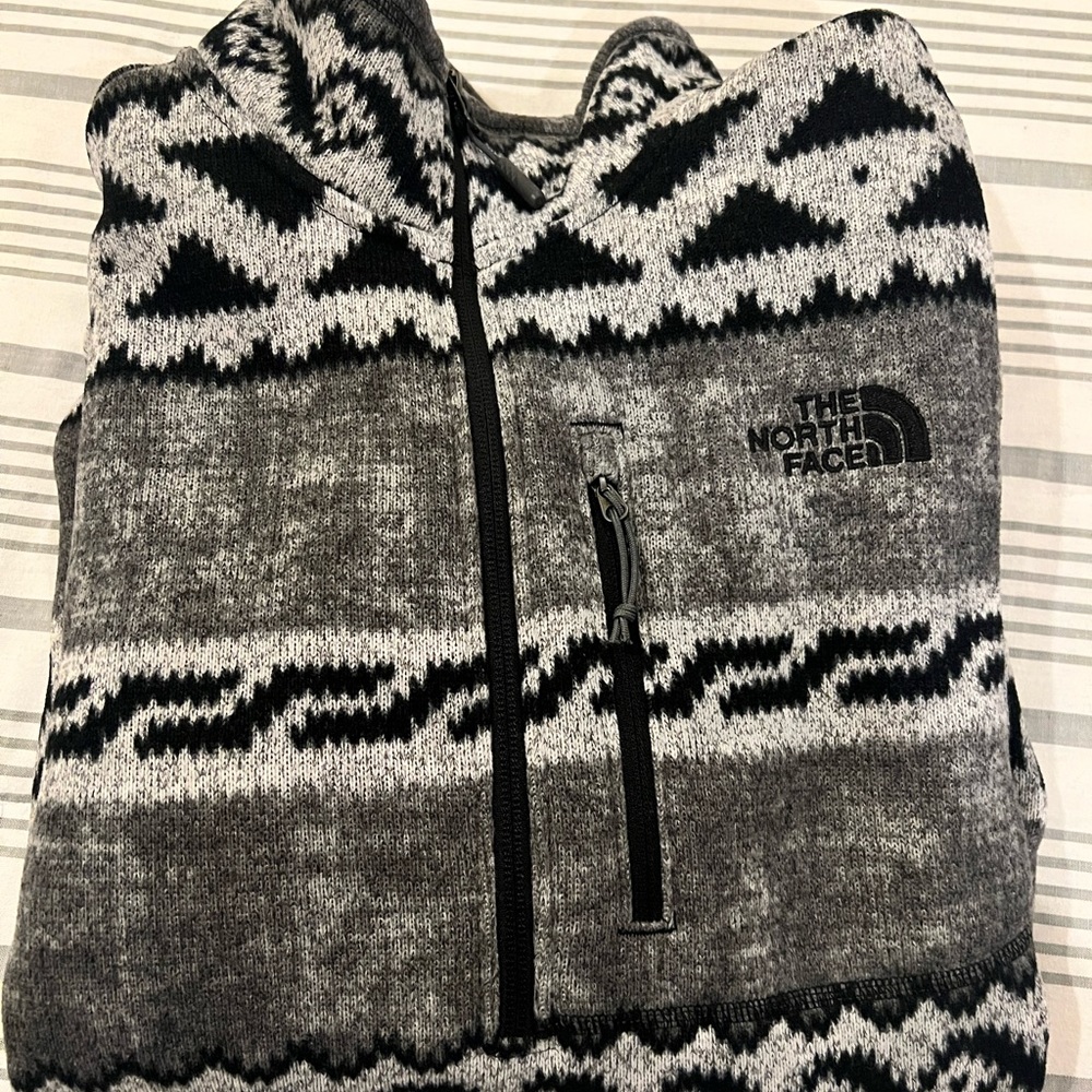 The North Face 1/4 zip. Black/White pattern. Size Medium.